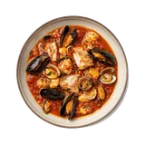 Brodetto alla giuliese on stoneware bowl with Clams, Cod, Garlic