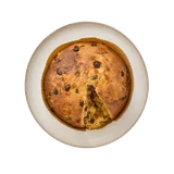 Panettone on stoneware bowl with Butter, Candied Peel, Egg