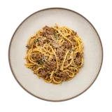 Spaghetti alla chitarra on stoneware bowl with Lamb, Olive Oil, pecorino