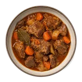 Spezzatino di pecora on stoneware bowl with Bay Leaf, Carrot, Mutton