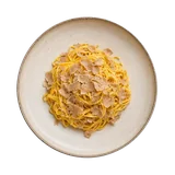 Tajarin al Tartufo on stoneware bowl with Butter, Egg Yolk, parmesan