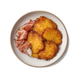 Tortei di patate on stoneware bowl with Butter, Egg, Flour