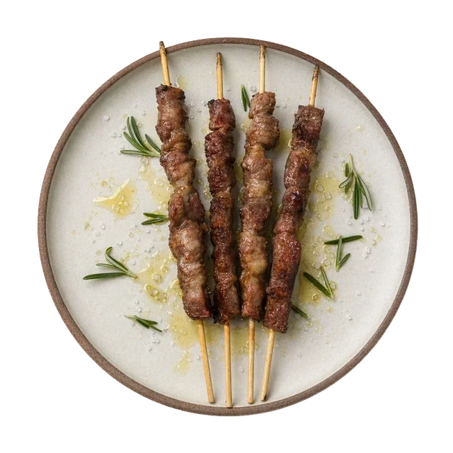 Arrosticini on stoneware bowl with Lamb, Olive Oil, Rosemary