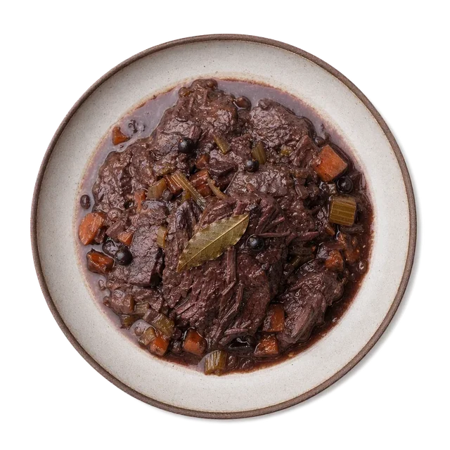 Brasato al Barolo on stoneware bowl with Bay Leaf, Beef Chuck, Carrot
