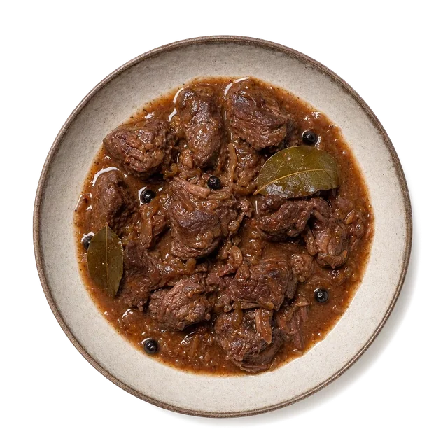 Carbonade on stoneware bowl with Bay Leaf, Beef Broth, Beef Chuck