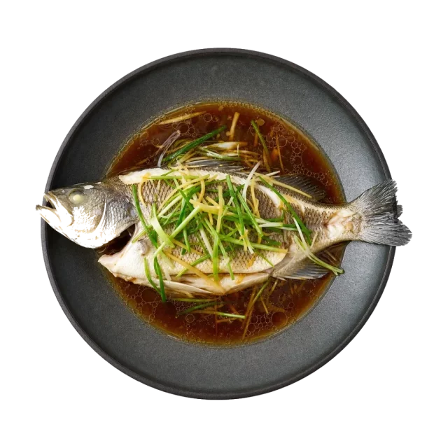 Steamed sea bass, plated