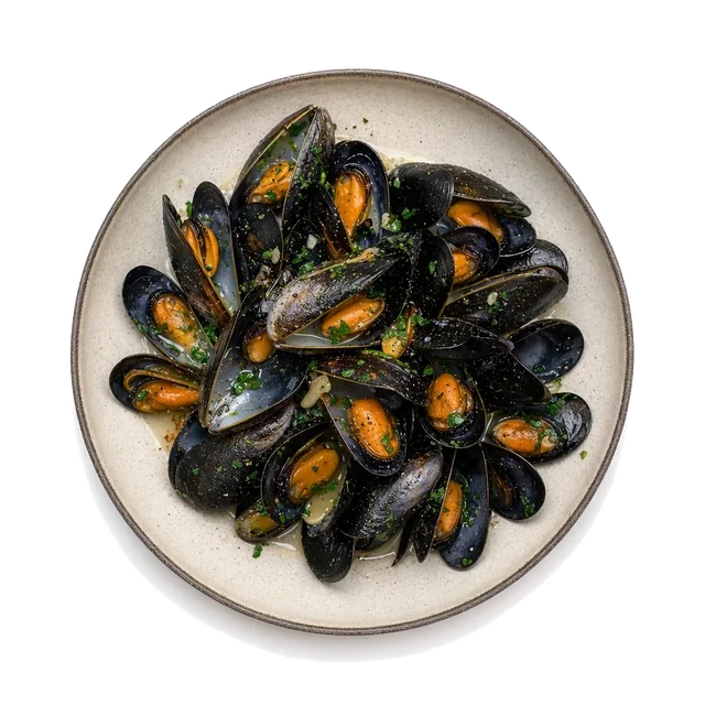 Impepata di cozze on stoneware bowl with Garlic, Mussels, Olive Oil