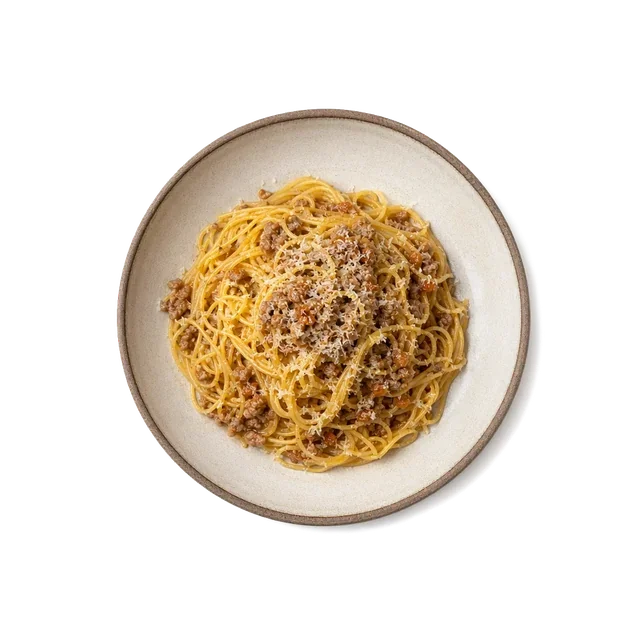 Maccheroncini di Campofilone on stoneware bowl with Butter, Egg Pasta, Olive Oil
