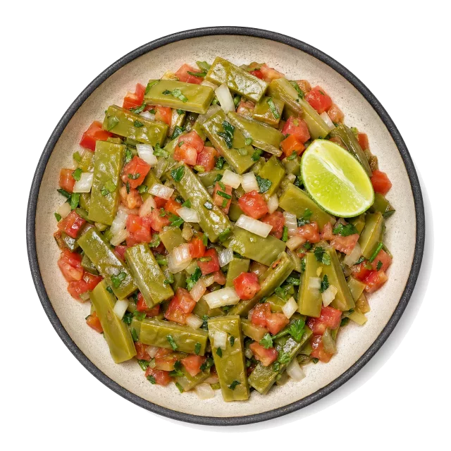 Nopales plated with nopales, tomato, onion