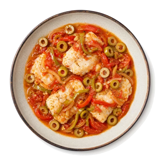 Pescado a la Veracruzana plated with cod, tomato, olive