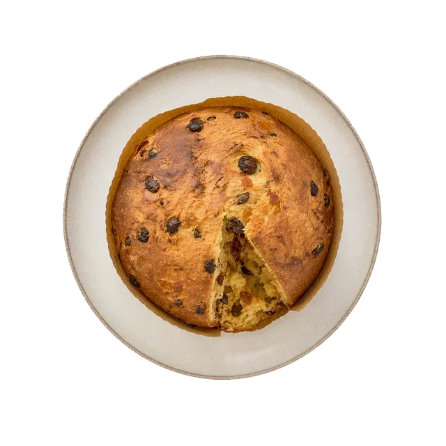Panettone on stoneware bowl with Butter, Candied Peel, Egg