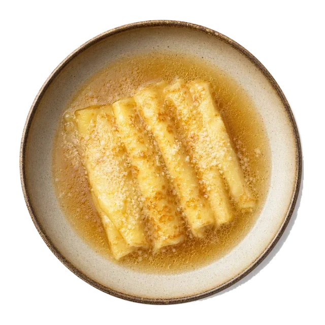 Scrippelle on stoneware bowl with Beef Broth, Crepes, Egg