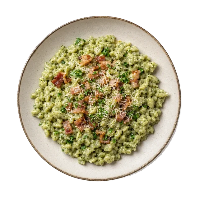 Spatzle or Tyrolean dumplings on stoneware bowl with Butter, Milk, parmesan