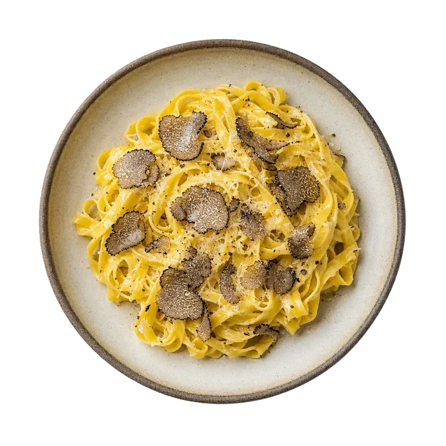 Tagliatelle al tartufo di Acqualagna on stoneware bowl with Black Truffle, Butter, Olive Oil