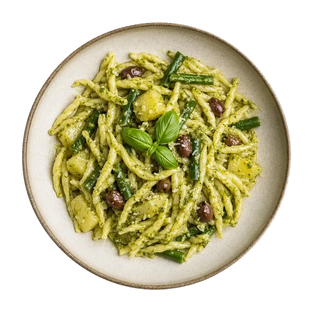 Trofie al pesto on stoneware bowl with Basil, Garlic, Olive Oil