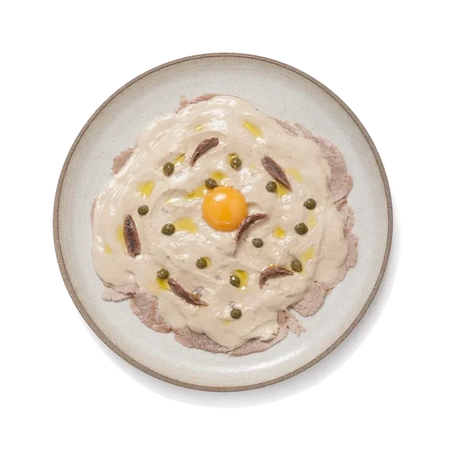 Vitello Tonnato on stoneware bowl with Anchovy, Caper, Egg Yolk