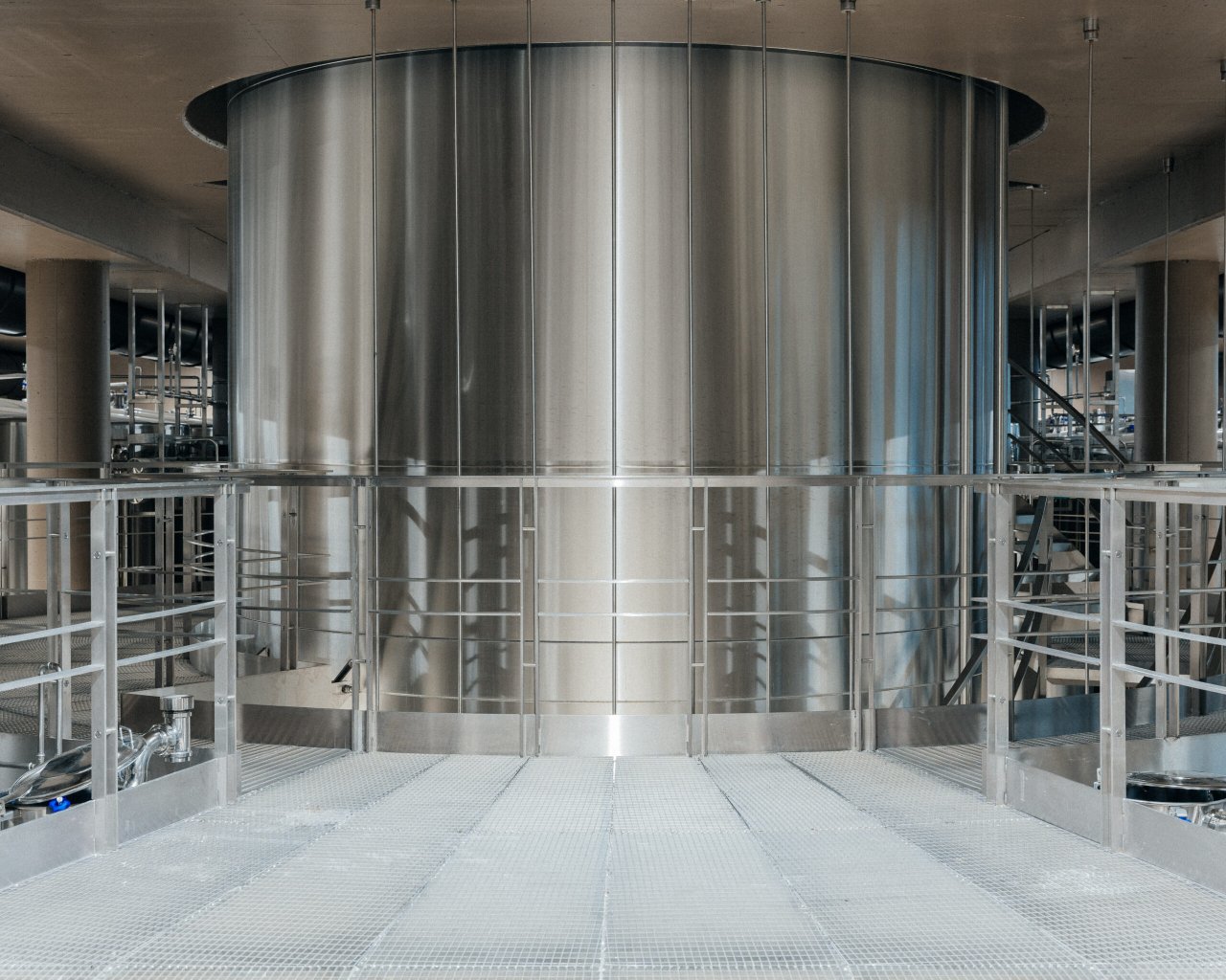Stainless steel tanks inside the gravity-fed C&agrave; Maiol cellar