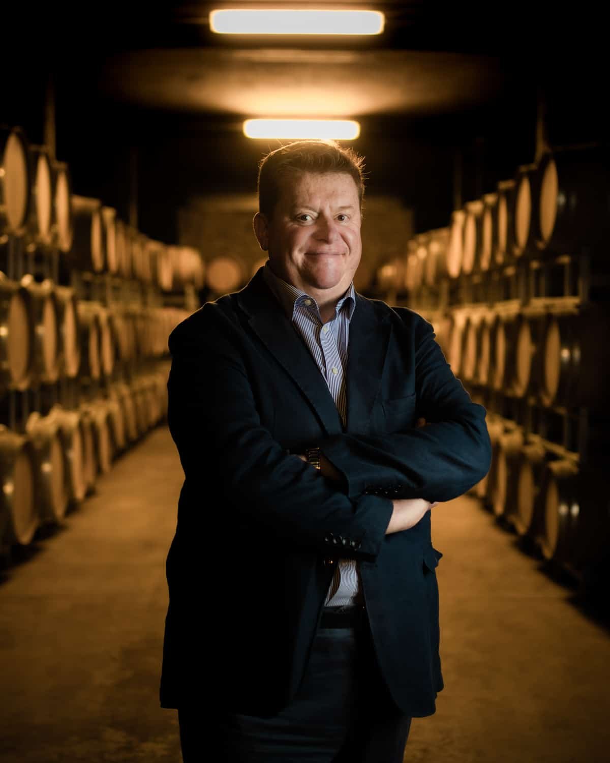 Silvano Brescianini in the Barone Pizzini cellar