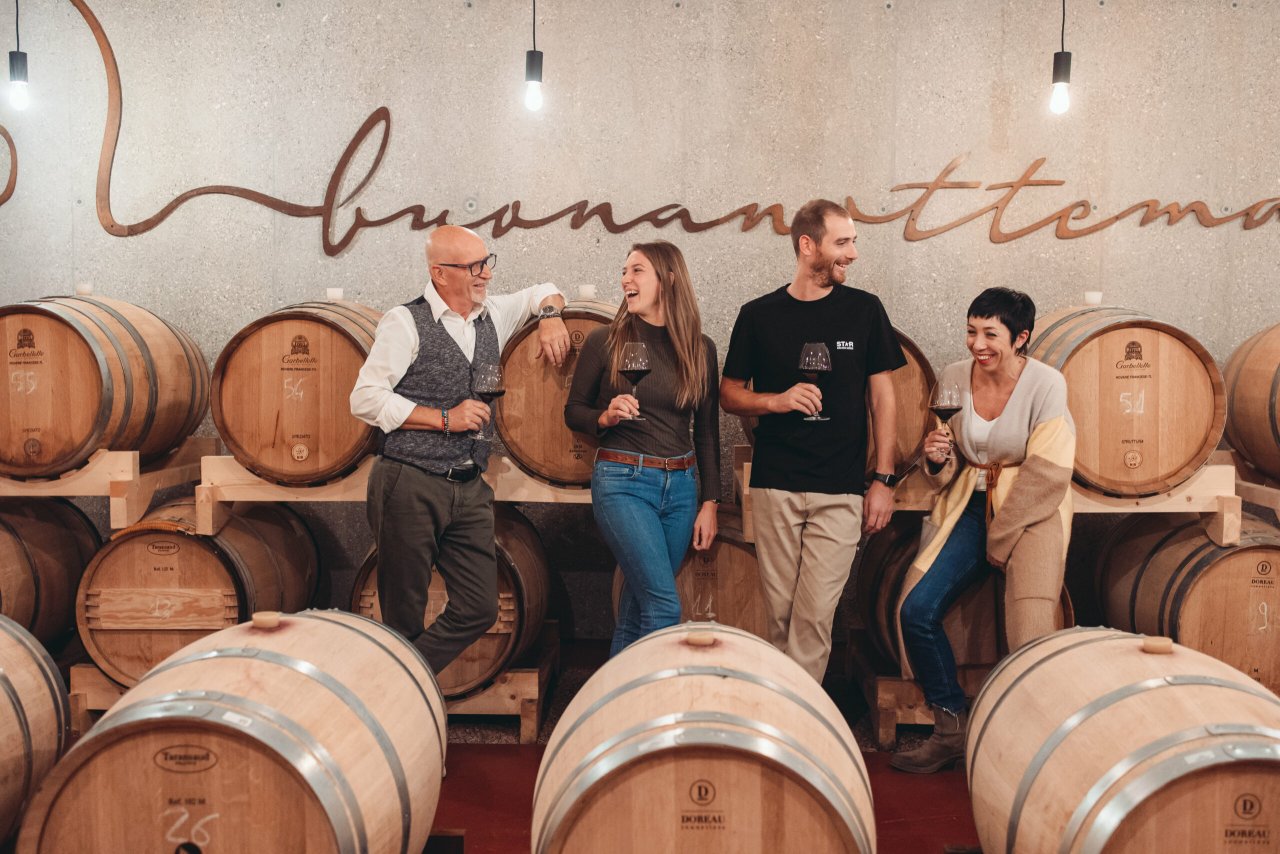 The Pizzolato family in the barrel cellar at Villorba