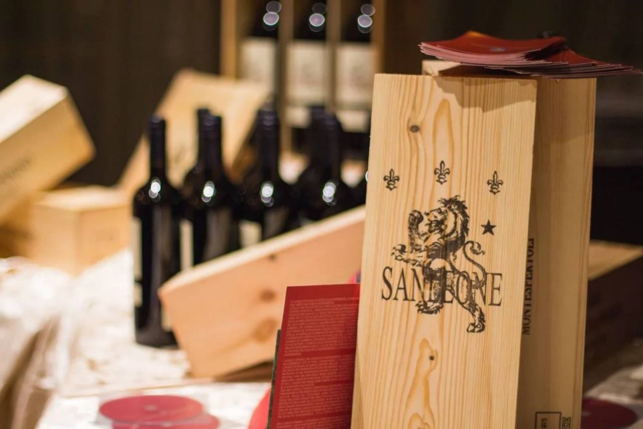 Wooden wine cases and bottles of Castello Sonnino's San Leone