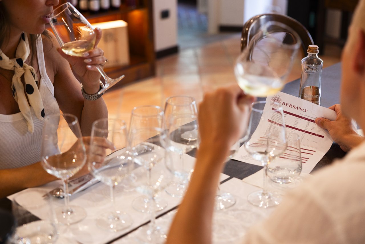 Glasses lined up on a Bersano tasting mat during a tasting at Nizza Monferrato