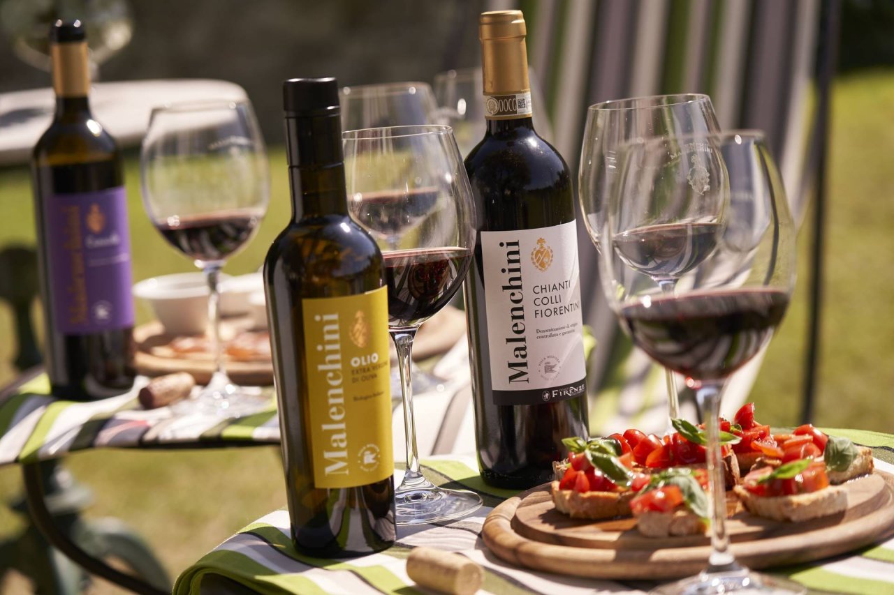 Picnic in the vineyard in the hills of Florence at Malenchini Wine Estate