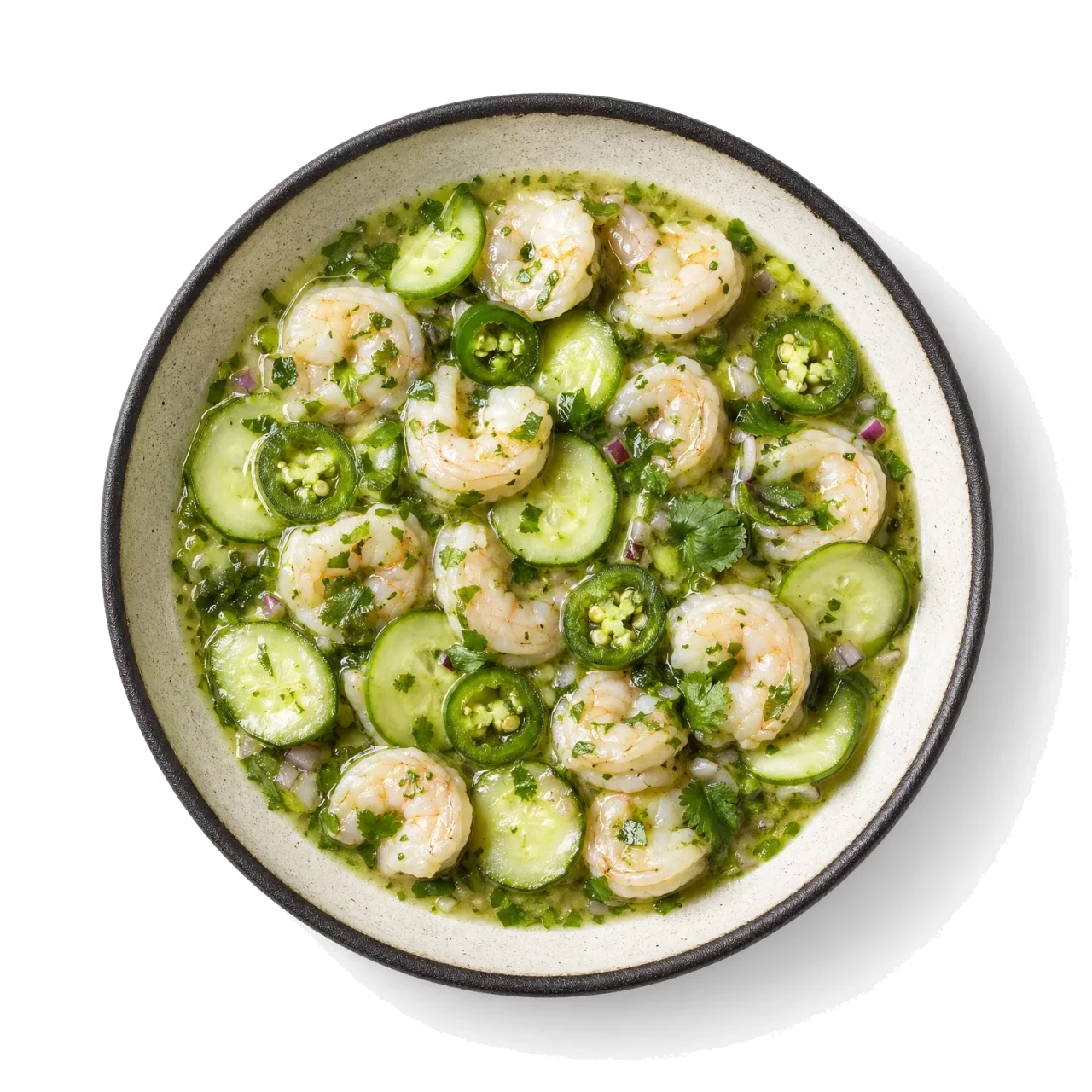 Aguachile plated with shrimp, lime, jalapeno