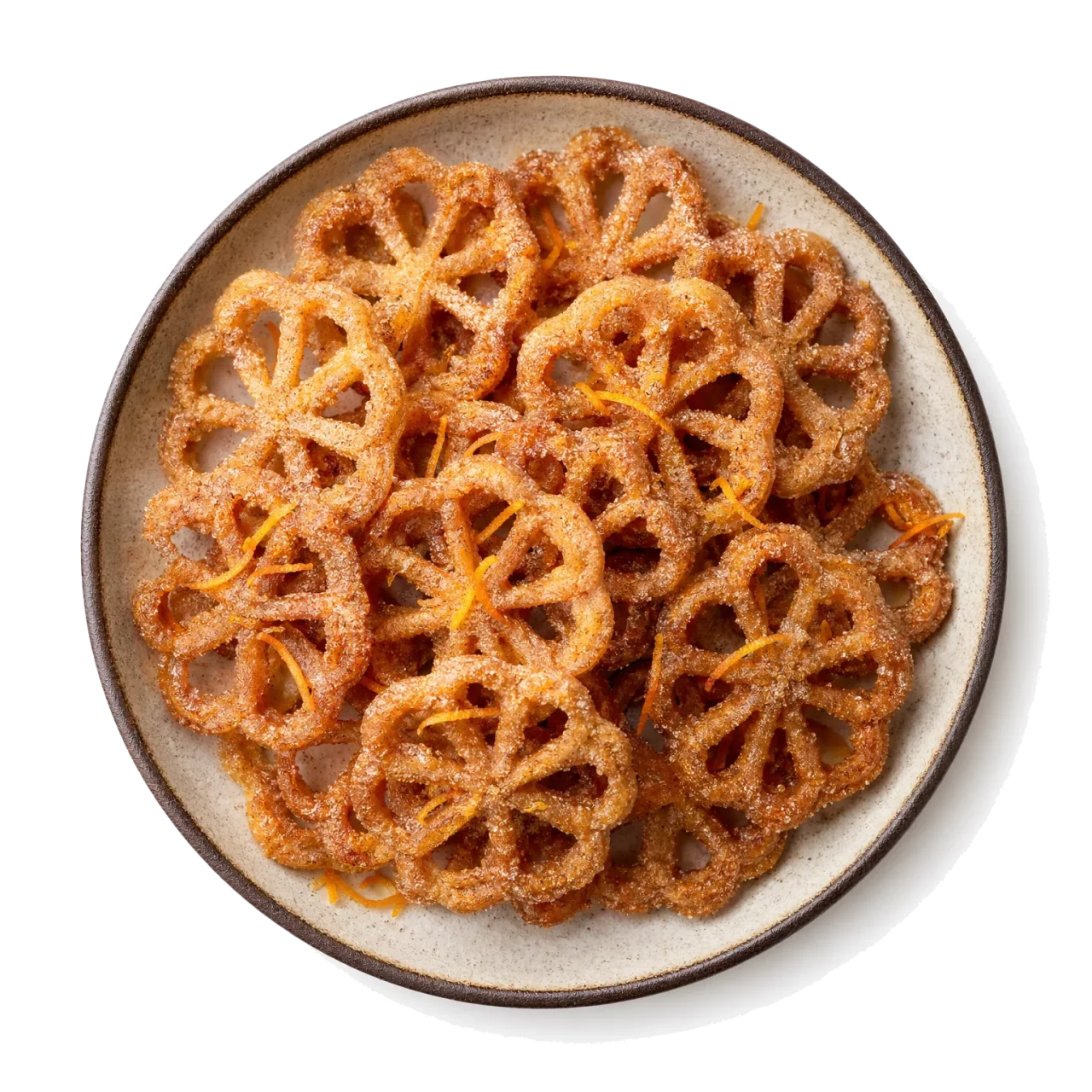 Bunuelos plated with flour, sugar, cinnamon