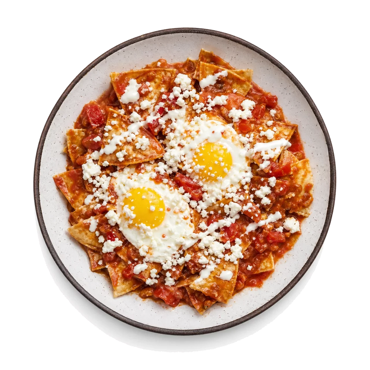 Chilaquiles plated with corn tortilla, tomato, chili