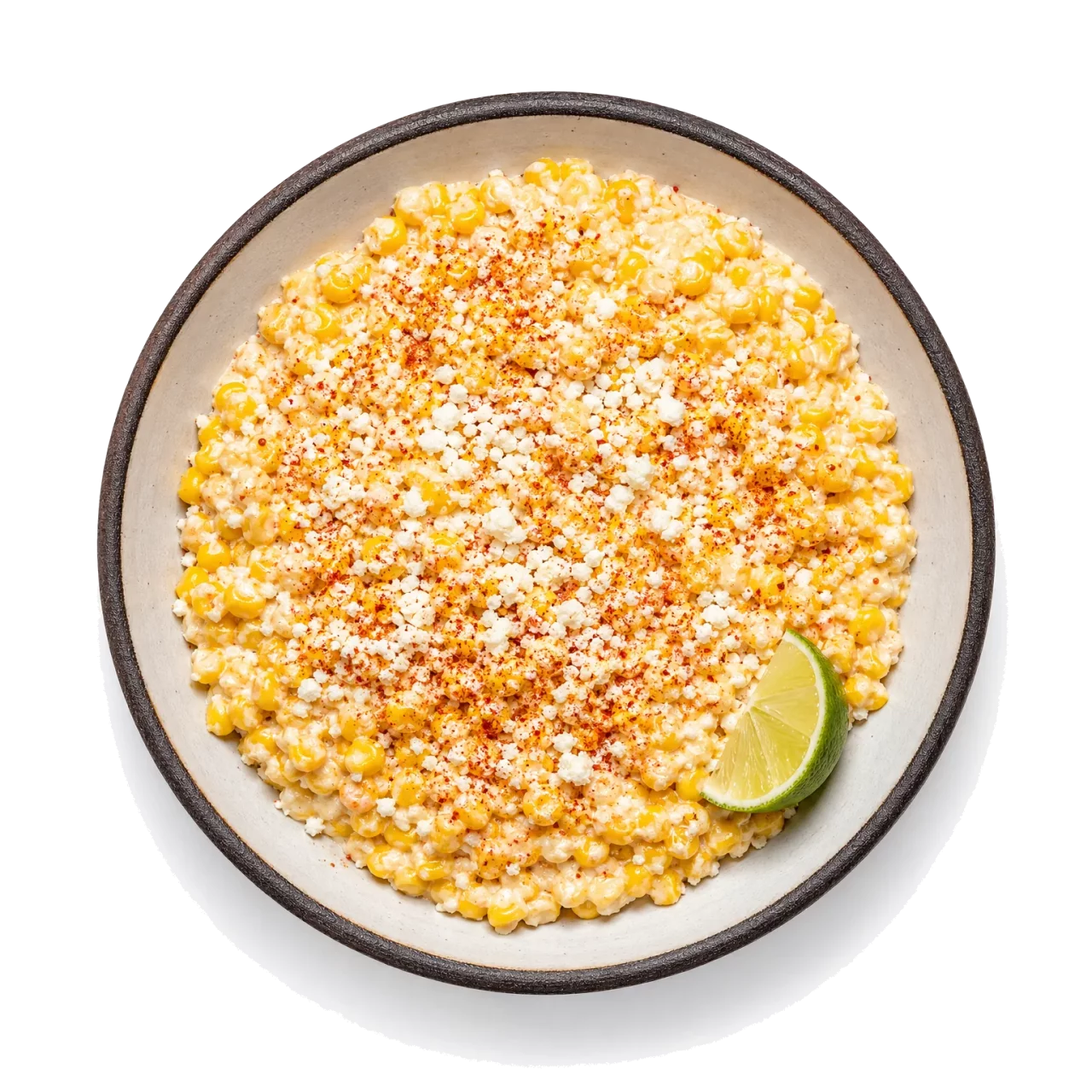 Esquites plated with corn, cream, queso fresco