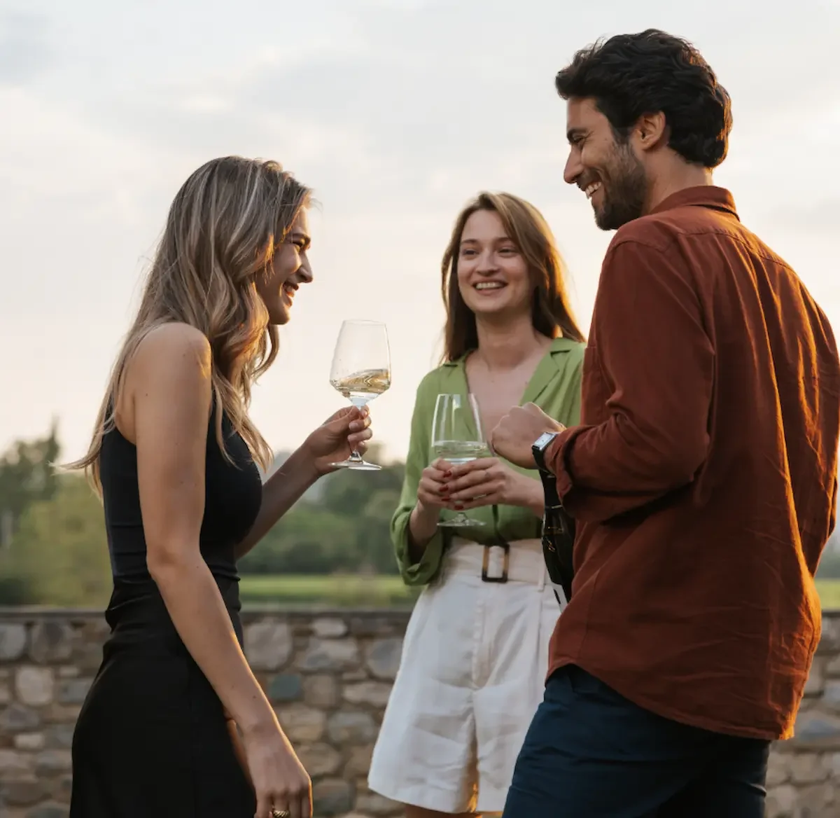 Guests tasting Perlage sparkling wines on the estate terrace