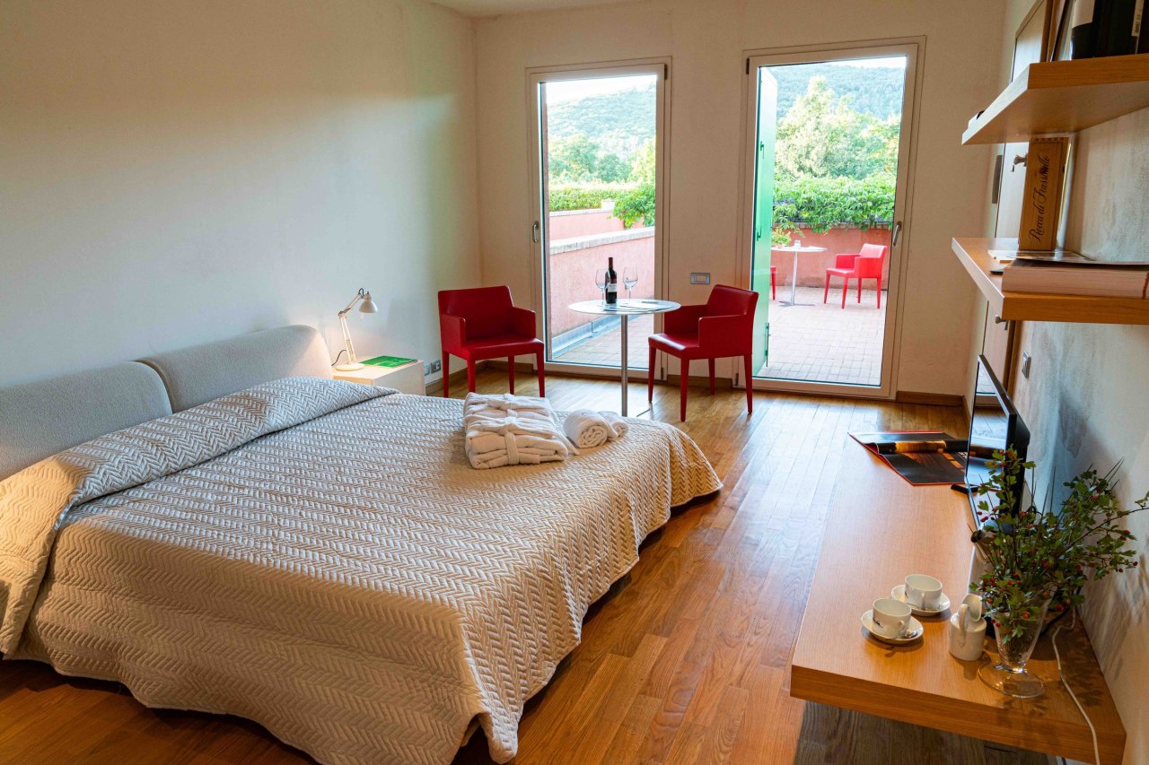 Stay in the guest house at Rocca di Frassinello