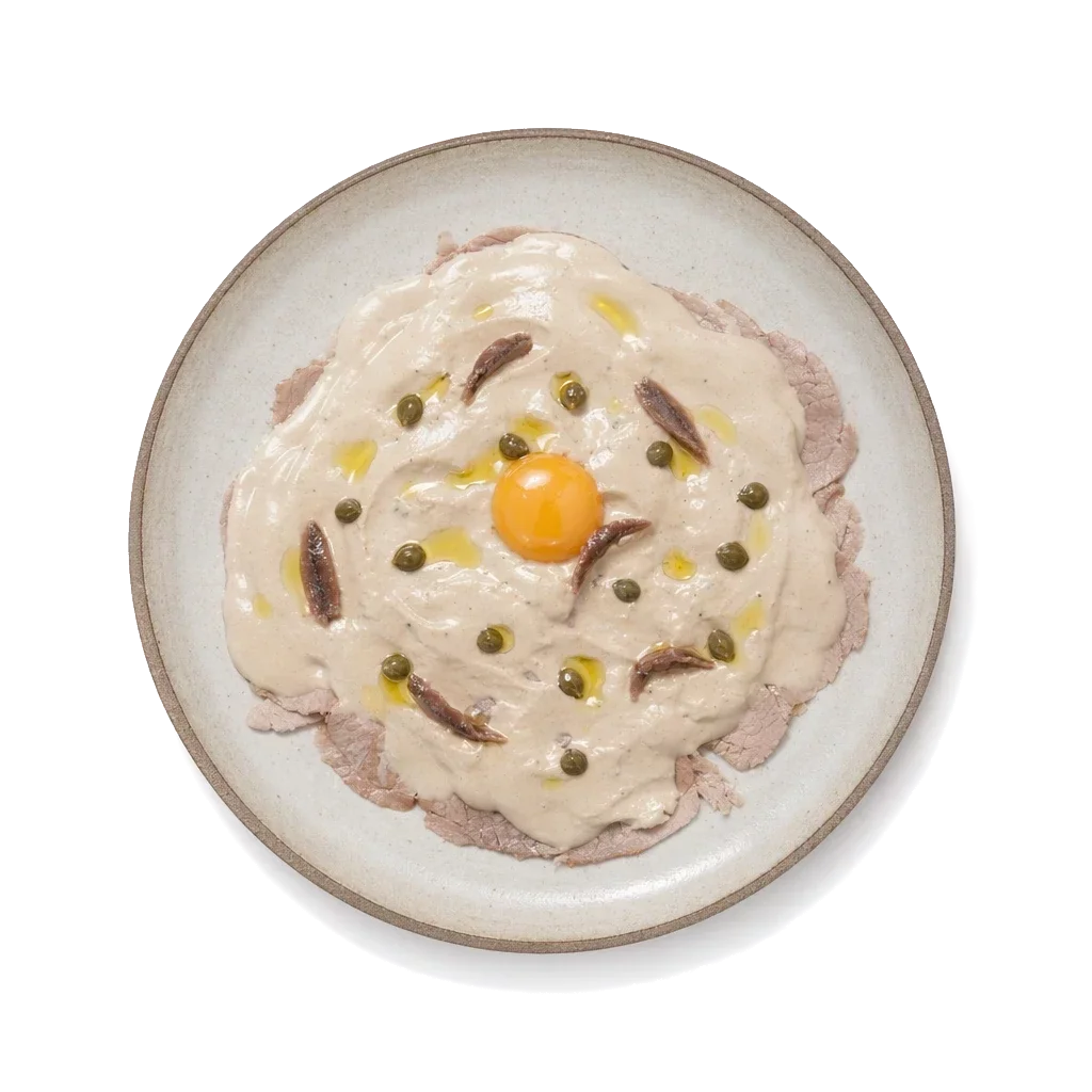 Vitello Tonnato on stoneware bowl with Anchovy, Caper, Egg Yolk
